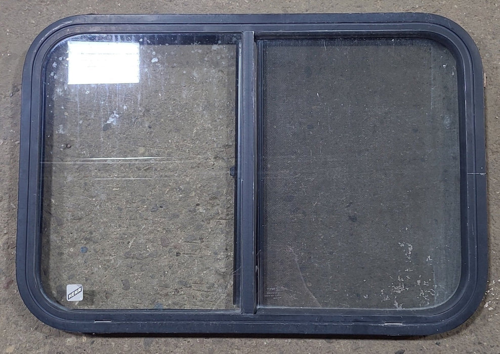 Used Black Radius Opening Window : 27 1/2" W x 18 5/8" H x 1" D