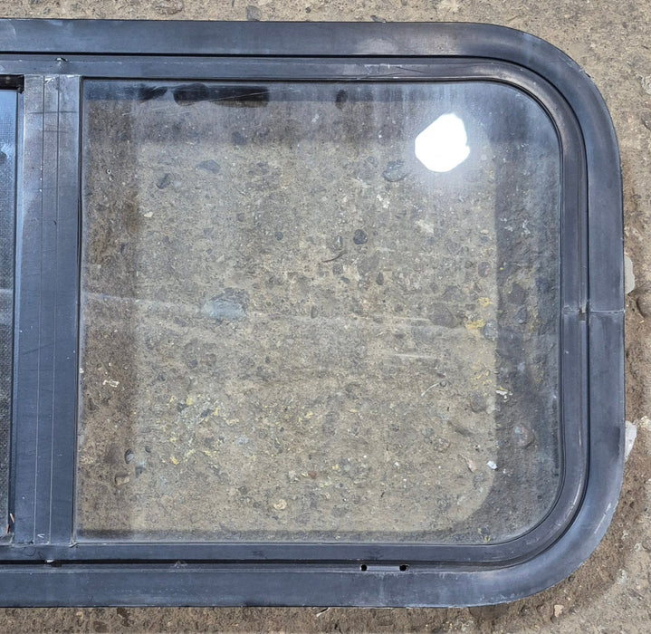 Used Black Radius Opening Window : 29 1/2" W x 14 3/4" H x 1 7/8"