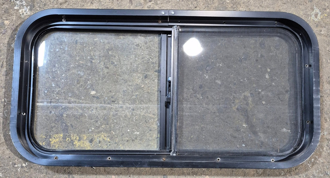 Used Black Radius Opening Window : 29 1/2" W x 14 3/4" H x 1 7/8"