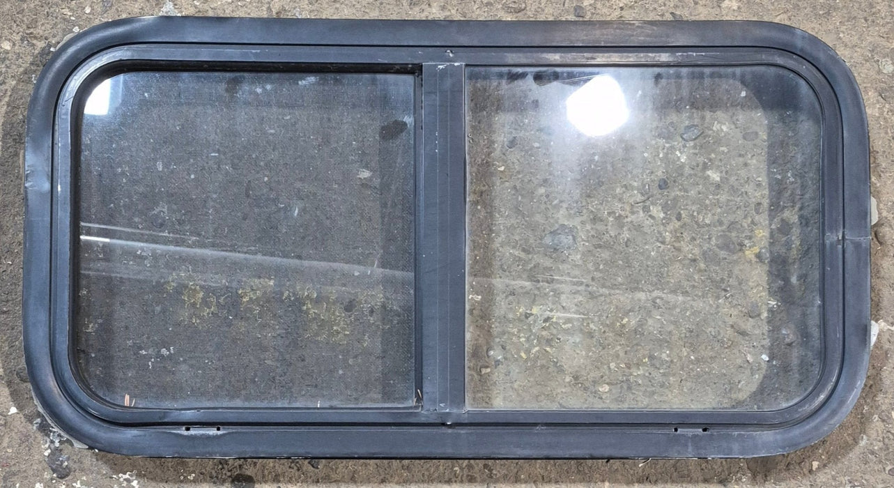 Used Black Radius Opening Window : 29 1/2" W x 14 3/4" H x 1 7/8"
