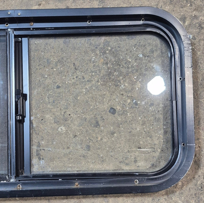 Used Black Radius Opening Window : 29 1/2" W x 14 3/4" H x 1 7/8"
