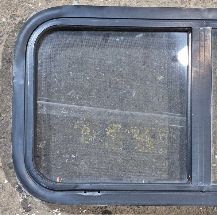 Used Black Radius Opening Window : 29 1/2" W x 14 3/4" H x 1 7/8"