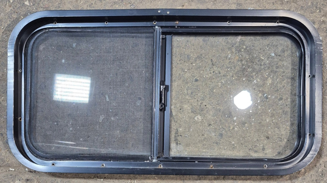 Used Black Radius Opening Window : 29 1/2" W x 14 3/4" H x 1 7/8"