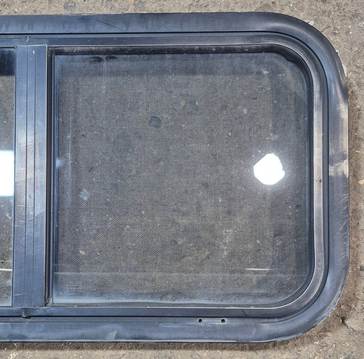 Used Black Radius Opening Window : 29 1/2" W x 14 3/4" H x 1 7/8"