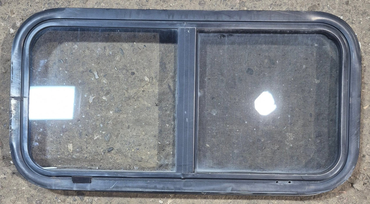 Used Black Radius Opening Window : 29 1/2" W x 14 3/4" H x 1 7/8"