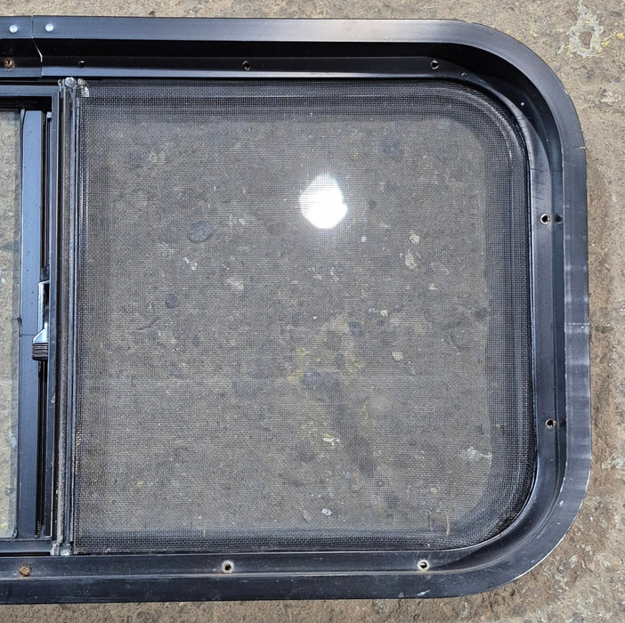 Used Black Radius Opening Window : 29 1/2" W x 14 3/4" H x 1 7/8"