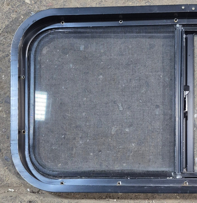Used Black Radius Opening Window : 29 1/2" W x 14 3/4" H x 1 7/8"