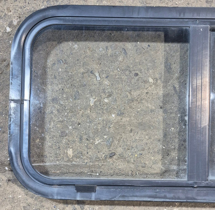 Used Black Radius Opening Window : 29 1/2" W x 14 3/4" H x 1 7/8"