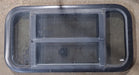 Used Black Radius Opening Window : 29 1/2" W x 14 5/8" H x 2" D - Young Farts RV Parts