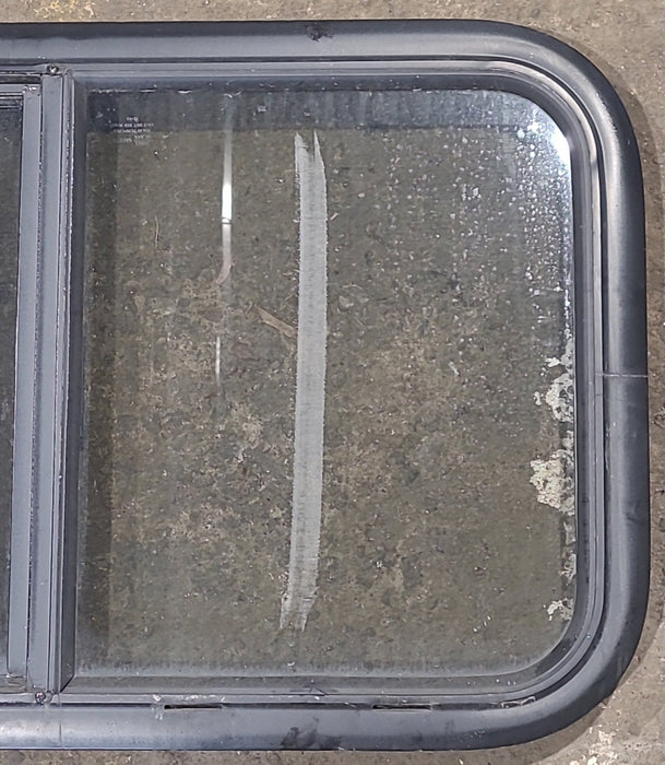 Used Black Radius Opening Window : 29 1/2" W x 17 1/2" H x 1 3/4" D