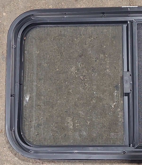 Used Black Radius Opening Window : 29 1/2" W x 17 1/2" H x 1 3/4" D