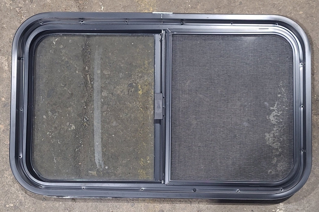Used Black Radius Opening Window : 29 1/2" W x 17 1/2" H x 1 3/4" D