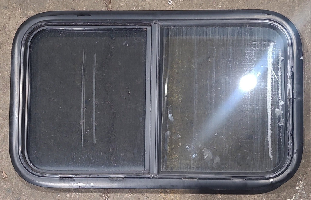 Used Black Radius Opening Window : 29 1/2" W x 17 1/2" H x 1 3/4" D