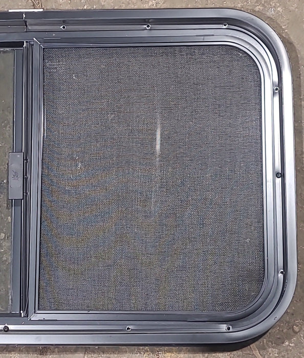 Used Black Radius Opening Window : 29 1/2" W x 17 1/2" H x 1 3/4" D