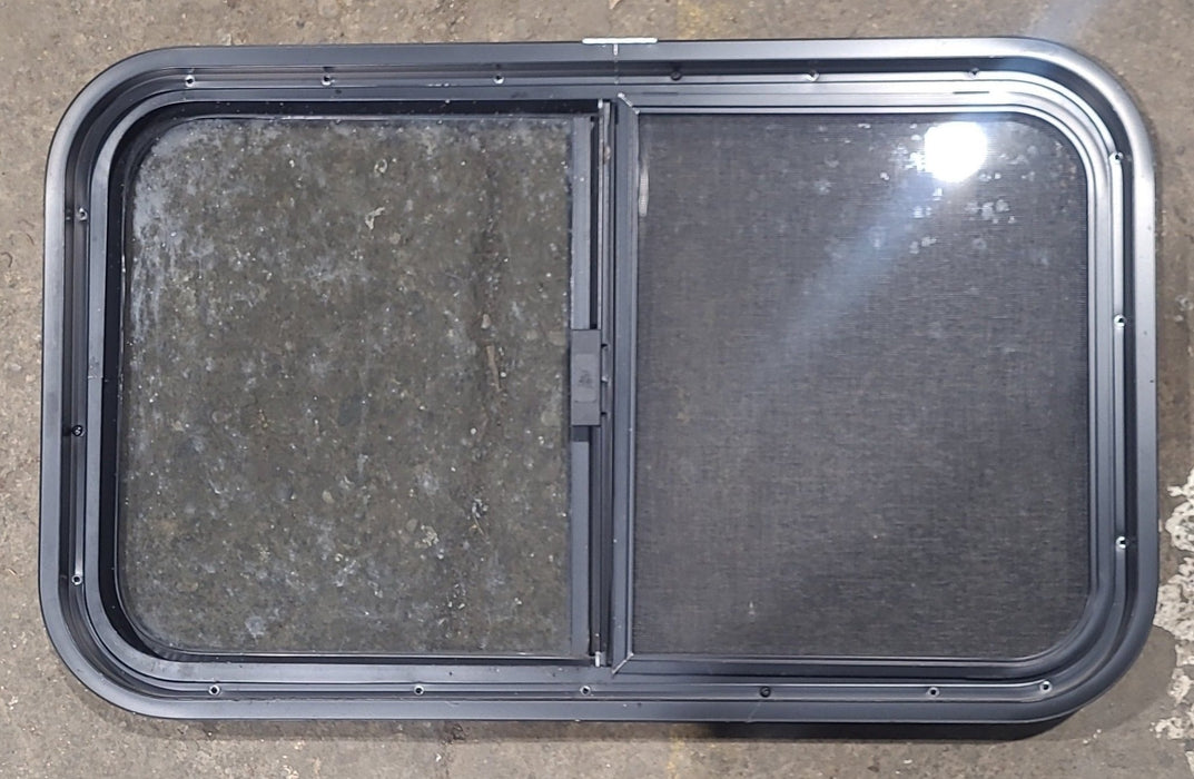 Used Black Radius Opening Window : 29 1/2" W x 17 1/2" H x 1 3/4" D
