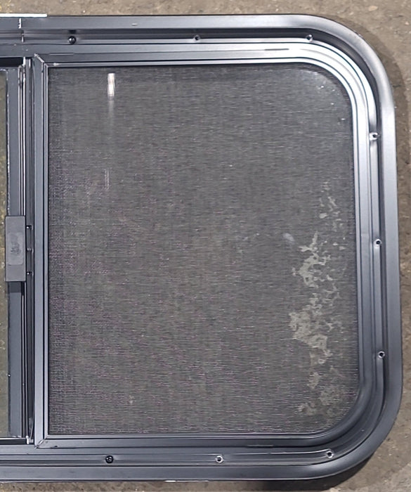 Used Black Radius Opening Window : 29 1/2" W x 17 1/2" H x 1 3/4" D