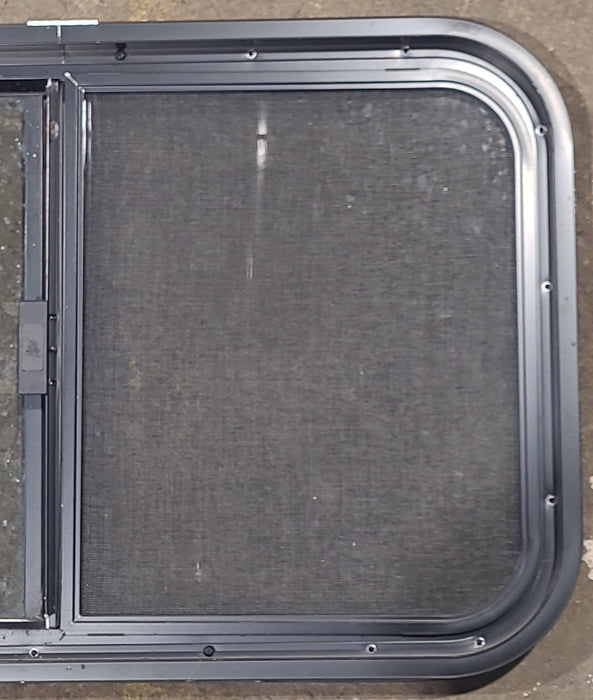 Used Black Radius Opening Window : 29 1/2" W x 17 1/2" H x 1 3/4" D