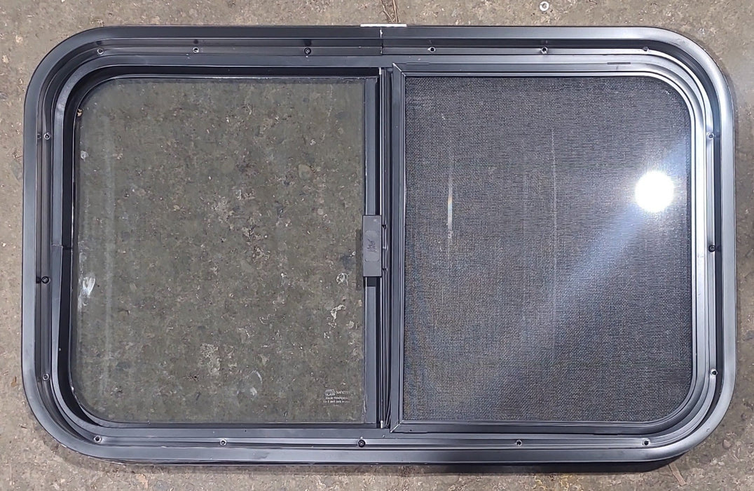 Used Black Radius Opening Window : 29 1/2" W x 17 1/2" H x 1 3/4" D