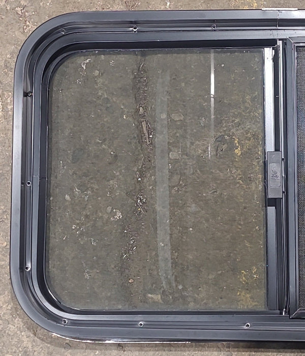 Used Black Radius Opening Window : 29 1/2" W x 17 1/2" H x 1 3/4" D