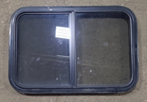 Used Black Radius Opening Window : 29 1/2" W x 19 1/2" H x 1 3/4" D - Young Farts RV Parts