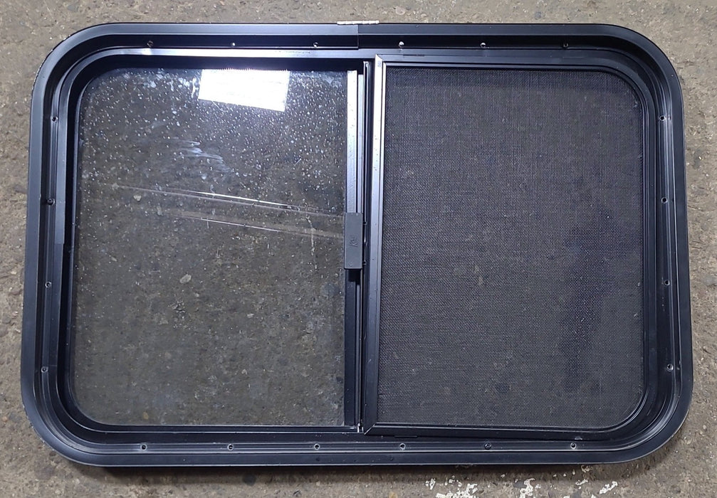 Used Black Radius Opening Window : 29 1/2" W x 19 1/2" H x 1 7/8" D - Young Farts RV Parts