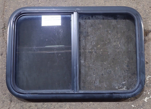 Used Black Radius Opening Window : 29 1/2" W x 19 1/2" H x 1 7/8" D - Young Farts RV Parts