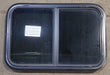 Used Black Radius Opening Window : 29 1/2" W x 19 1/2" H x 1 7/8" D - Young Farts RV Parts