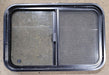 Used Black Radius Opening Window : 29 1/2" W x 19 1/4" H x 1 7/8" - Young Farts RV Parts