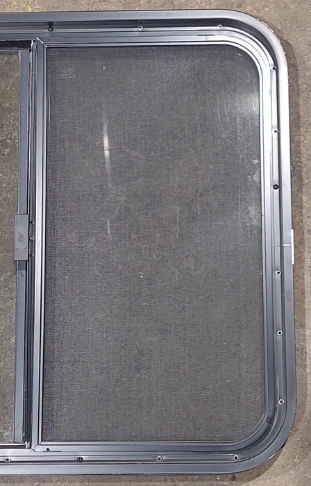 Used Black Radius Opening Window : 29 1/2" W x 25 1/2" H x 1 3/4" D - Young Farts RV Parts