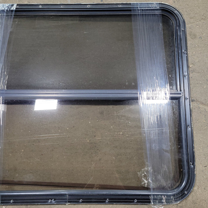 Used Black Radius Opening Window : 29 1/2" W X 34 3/4" H X 2" D - Young Farts RV Parts