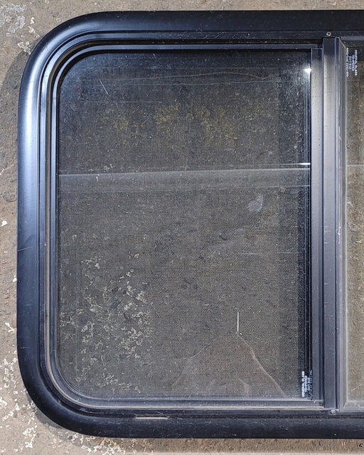 Used Black Radius Opening Window : 29 1/4" W x 19 1/2" H x 1 7/8" - Young Farts RV Parts