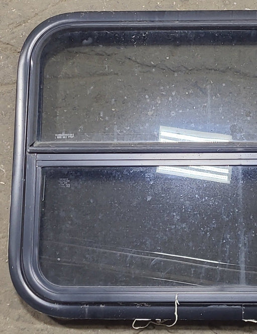 Used Black Radius Opening Window : 29 1/4" W x 21 1/2" H x 1 3/4" D - Young Farts RV Parts