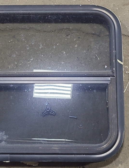 Used Black Radius Opening Window : 29 1/4" W x 21 1/2" H x 1 7/8" D - Young Farts RV Parts