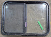 Used Black Radius Opening Window : 29 1/4" W x 21 1/4" H x 1 3/4" D - Young Farts RV Parts