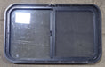 Used Black Radius Opening Window : 29 3/4" W x 17 3/4" H x 1 5/8" D - Young Farts RV Parts