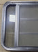 Used Black Radius Opening Window : 29 3/8" W x 22 1/2" H x 1 7/8" D - Young Farts RV Parts