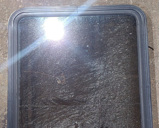 Used Black Radius Opening Window : 29" W x 39 1/2" H x 1 3/4" D - Young Farts RV Parts