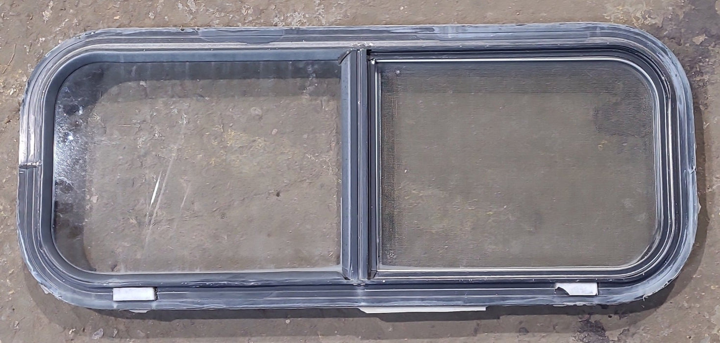 Used Black Radius Opening Window : 30 1/4" W x 11 3/4" H x 1 3/4" D
