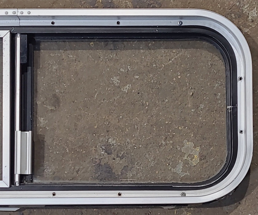 Used Black Radius Opening Window : 30 1/4" W x 11 3/4" H x 1 3/4" D