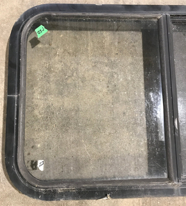 Used Black Radius Opening Window : 30 1/4" W x 17 3/4" H x 1 7/8" D - Young Farts RV Parts
