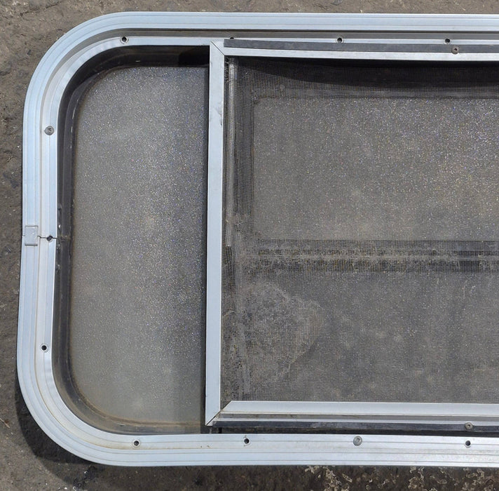 Used Black Radius Opening Window : 30 1/4" x 14 7/8" x 1 3/4" D - Young Farts RV Parts