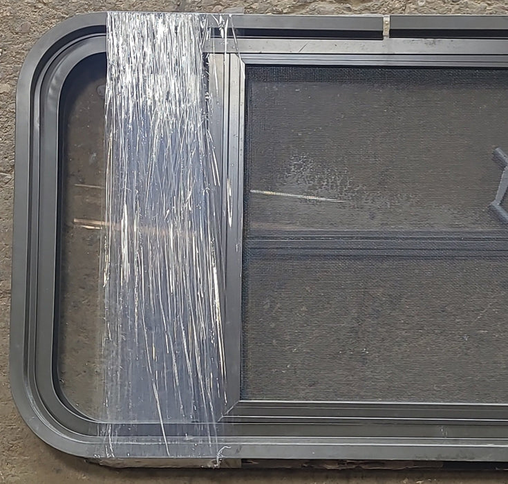 Used Black Radius Opening Window : 31 3/4" W x 16 1/2" H x 1 7/8" D