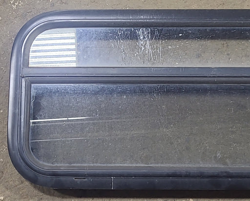 Used Black Radius Opening Window : 35 1/2" W x 14 1/4" H x 2" D - Young Farts RV Parts