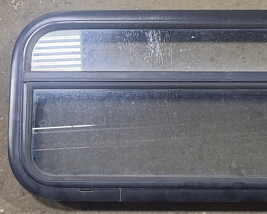 Used Black Radius Opening Window : 35 1/2" W x 14 1/4" H x 2" D - Young Farts RV Parts