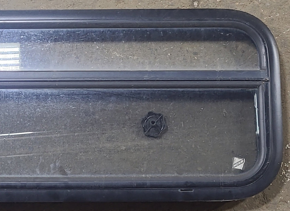 Used Black Radius Opening Window : 35 1/2" W x 14 1/4" H x 2" D - Young Farts RV Parts
