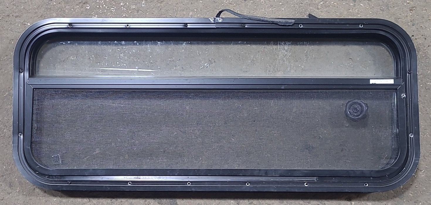 Used Black Radius Opening Window : 35 1/2" W x 14 1/4" H x 2" D - Young Farts RV Parts