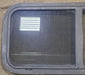 Used Black Radius Opening Window : 35 1/2" W x 15 3/4" H x 2" D - Young Farts RV Parts