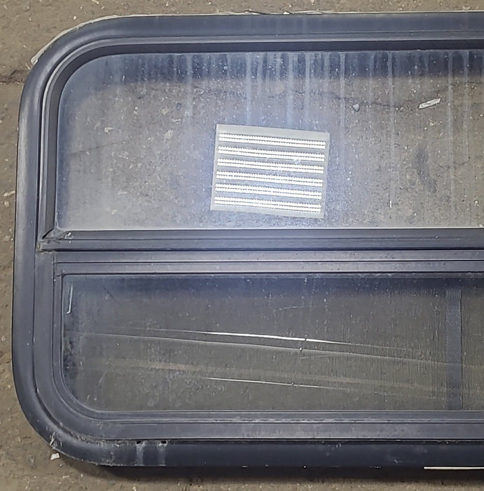 Used Black Radius Opening Window : 35 1/2" W X 17 1/4" H X 1 3/4" D