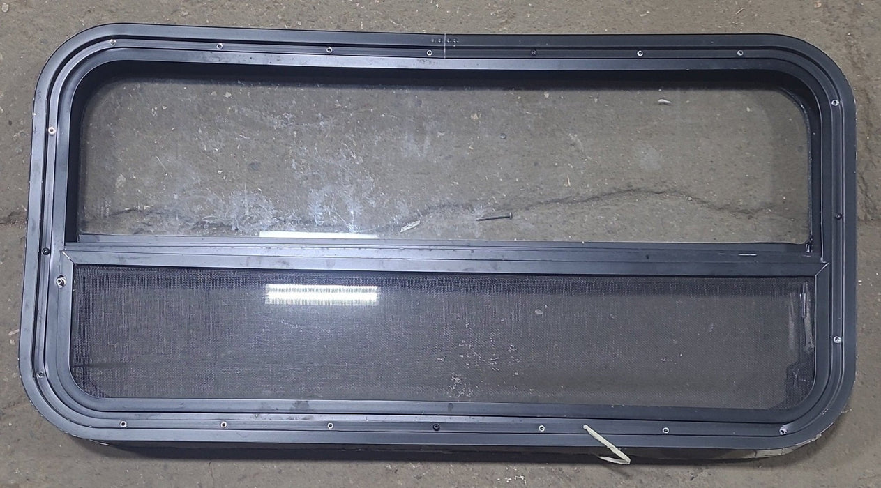 Used Black Radius Opening Window : 35 1/2" W X 17 1/4" H X 1 3/4" D