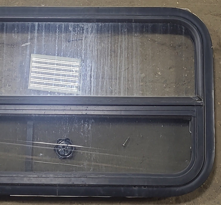 Used Black Radius Opening Window : 35 1/2" W X 17 1/4" H X 1 3/4" D